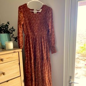 Cornelia Smocked Tiered Maxi Dress in Rust × 1
X-Small / Rust